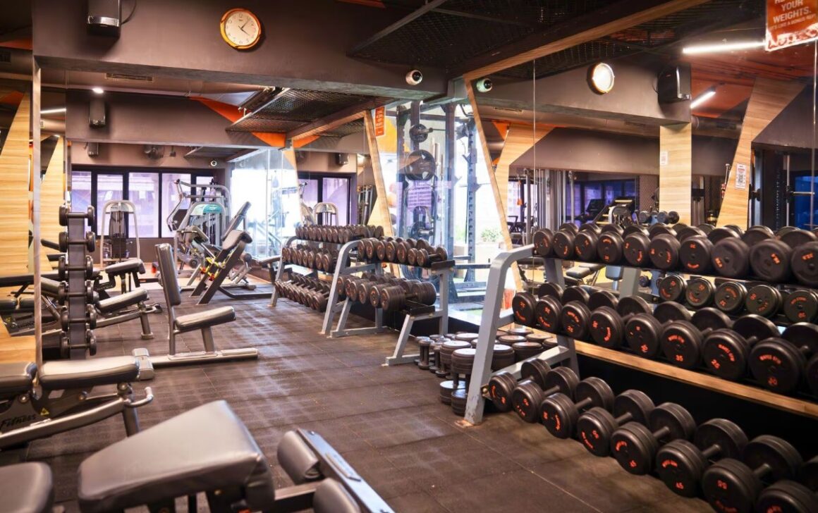 Upscale gym interior and personal training zone at Waves Gym Andheri West, Mumbai.