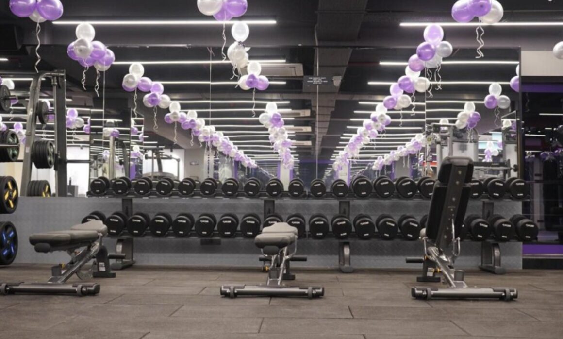 24/7 accessible cardio and strength training area at an Anytime Fitness club in India.