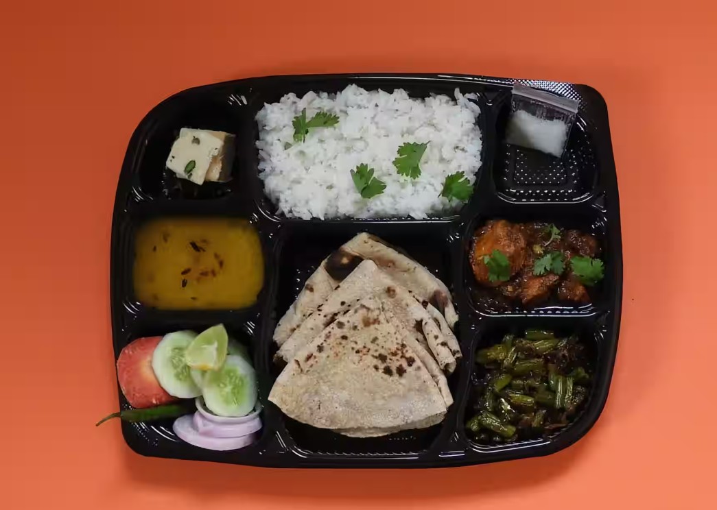 Image of the Tiffyy meal or logo/delivery vehicle