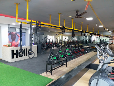 Interior view of Temple Fitness Gym in Koramangala, Bangalore, showing weight training area