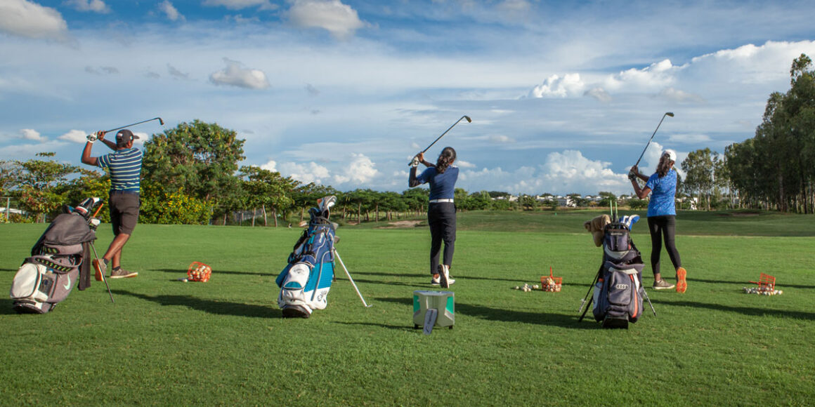 A professional golfer putting on the green, representing the individual financial burden in one of the most expensive sports to pursue professionally