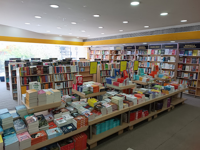Books in shelves and on table in Crossword book store in Jaipur